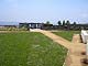 Pacific Palasades home with decoposed granite paths and sod.