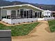 Pacific Palisades home with decomposed granite pathways, new walls and sod.